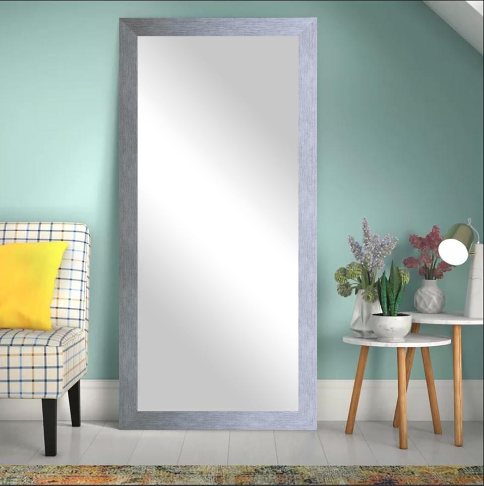 It'll be a big help when you're trying to put together outfits. <br /><br /><strong>Promising review:</strong> "Beautiful mirror, I&rsquo;m very happy I bought it. It came packaged very well, no damage at all. Worth the price." &mdash; <a href="https://go.skimresources.com?id=38395X987171&amp;xs=1&amp;xcust=-HPWayDaySale4-28-21-60896f93e4b09cce6c197126&amp;url=https%3A%2F%2Fwww.wayfair.com%2Fdecor-pillows%2Fpdp%2Febern-designs-anna-diana-wide-tall-full-length-mirror-w004244014.html" target="_blank" rel="noopener noreferrer">Tai</a><br /><br /><strong>Price:</strong> <a href="https://go.skimresources.com?id=38395X987171&amp;xs=1&amp;xcust=-HPWayDaySale4-28-21--60896f93e4b09cce6c197126&amp;url=https%3A%2F%2Fwww.wayfair.com%2Fdecor-pillows%2Fpdp%2Febern-designs-anna-diana-wide-tall-full-length-mirror-w004244014.html" target="_blank" rel="nofollow noopener noreferrer" data-skimlinks-tracking="5937619" data-vars-affiliate="www.dpbolvw.net" data-vars-campaign="BestFurnitureDealsWayfair-Keaveney-4-26-21-5937619" data-vars-href="https://www.dpbolvw.net/click-8209452-13720150?sid=BestFurnitureDealsWayfair-Keaveney-4-26-21-5937619&amp;url=https%3A%2F%2Fwww.wayfair.com%2Fdecor-pillows%2Fpdp%2Febern-designs-anna-diana-wide-tall-full-length-mirror-w004244014.html%3Fpiid%3D1524245364%2C1508399259" data-vars-link-id="16668608" data-vars-price="" data-vars-product-id="21099440" data-vars-product-img="https://secure.img1-ag.wfcdn.com/im/85009664/resize-h800-w800%5Ecompr-r85/8158/81586092/Anna-Diana+Wide+Tall+Full+Length+Mirror.jpg" data-vars-product-title="Anna-Diana Wide Tall Full Length Mirror" data-vars-redirecturl="https://www.wayfair.com/decor-pillows/pdp/ebern-designs-anna-diana-wide-tall-full-length-mirror-w004244014.html?piid=1524245364,1508399259" data-vars-retailers="wayfair" data-ml-dynamic="true" data-ml-dynamic-type="sl" data-orig-url="https://www.dpbolvw.net/click-8209452-13720150?sid=BestFurnitureDealsWayfair-Keaveney-4-26-21-5937619&amp;url=https%3A%2F%2Fwww.wayfair.com%2Fdecor-pillows%2Fpdp%2Febern-designs-anna-diana-wide-tall-full-length-mirror-w004244014.html%3Fpiid%3D1524245364%2C1508399259" data-ml-id="89">$263.98</a> (originally $700; available in four finishes and sizes)<br /><br /><i>See more decor options <a href="https://go.skimresources.com?id=38395X987171&amp;xs=1&amp;xcust=-HPWayDaySale4-28-21-60896f93e4b09cce6c197126&amp;url=https%3A%2F%2Fwww.wayfair.com%2Fdaily-sales%2Fway-day%253a-decor-%2526-pillows%7Ee220844.html" target="_blank" rel="noopener noreferrer">from $24.99</a>. </i>