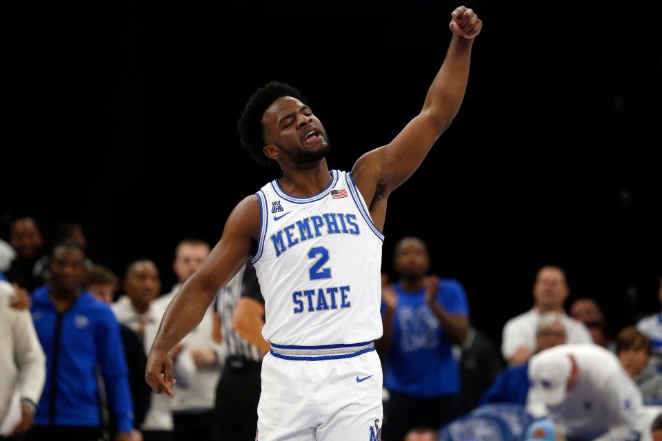 Memphis Tigers guard Alex Lomax (2) reacts after a three point basket during the first half against the Mississippi Rebels at FedExForum.