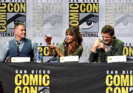 <p>Halle Berry raises a glass as costars Channing Tatum (left) and Pedro Pascal (right) look on at Fox Comic-Con panel on July 20, 2017, in San Diego. (Photo: Kevin Winter/Getty Images) </p>