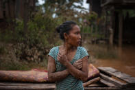 <p>Villagers evacuate to safer grounds after flash floods engulfed their villages the other day, on July 26, 2018 in Attepeu, southern Laos. (Photo: Jes Aznar/Getty Images) </p>