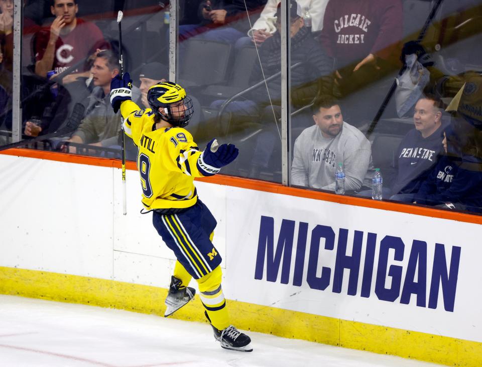 FILE - Michigan's Adam Fantilli celebrates scoring a goal against Colgate during an NCAA hockey game on Friday, March 24, 2023 Allentown, Pa. Fantilli, a freshman, has been named the recipient of the Hobey Baker Memorial Award, recognizing the top player in college hockey on Friday, April 7, 2023. (AP Photo/Jason E. Miczek, File)