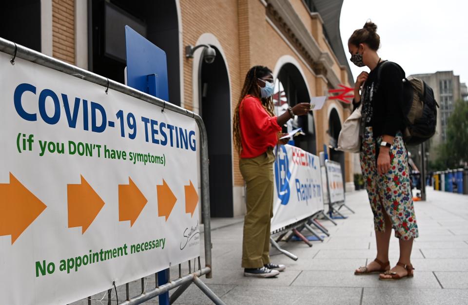 A COVID testing centre in London. Vaccinated people who are sneezing can order a test through the ZOE app. (EPA)