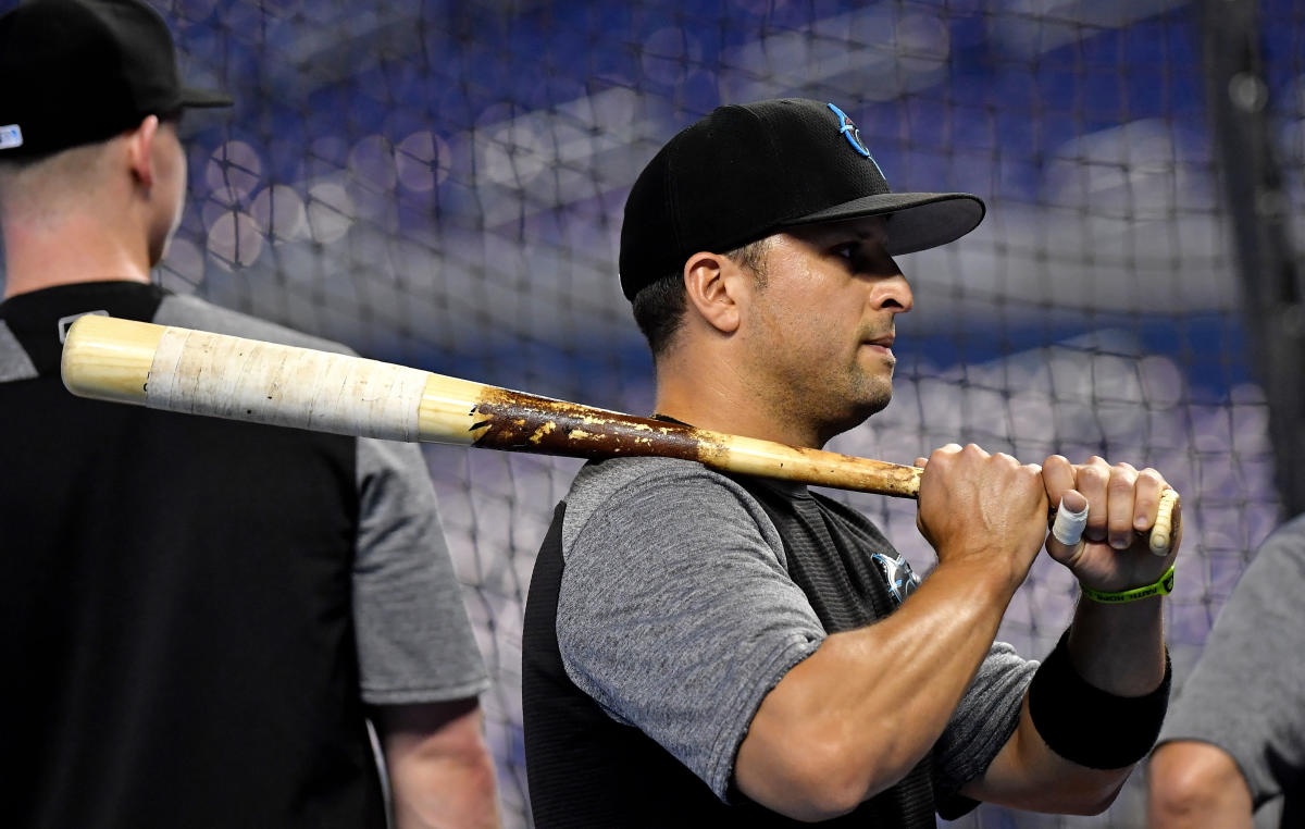 Miami Marlins' Martin Prado hits a single during the third inning