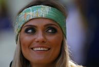 A Brazil fan waits for the start of the 2014 World Cup quarter-finals between Brazil and Colombia at the Castelao arena in Fortaleza July 4, 2014. REUTERS/Stefano Rellandini