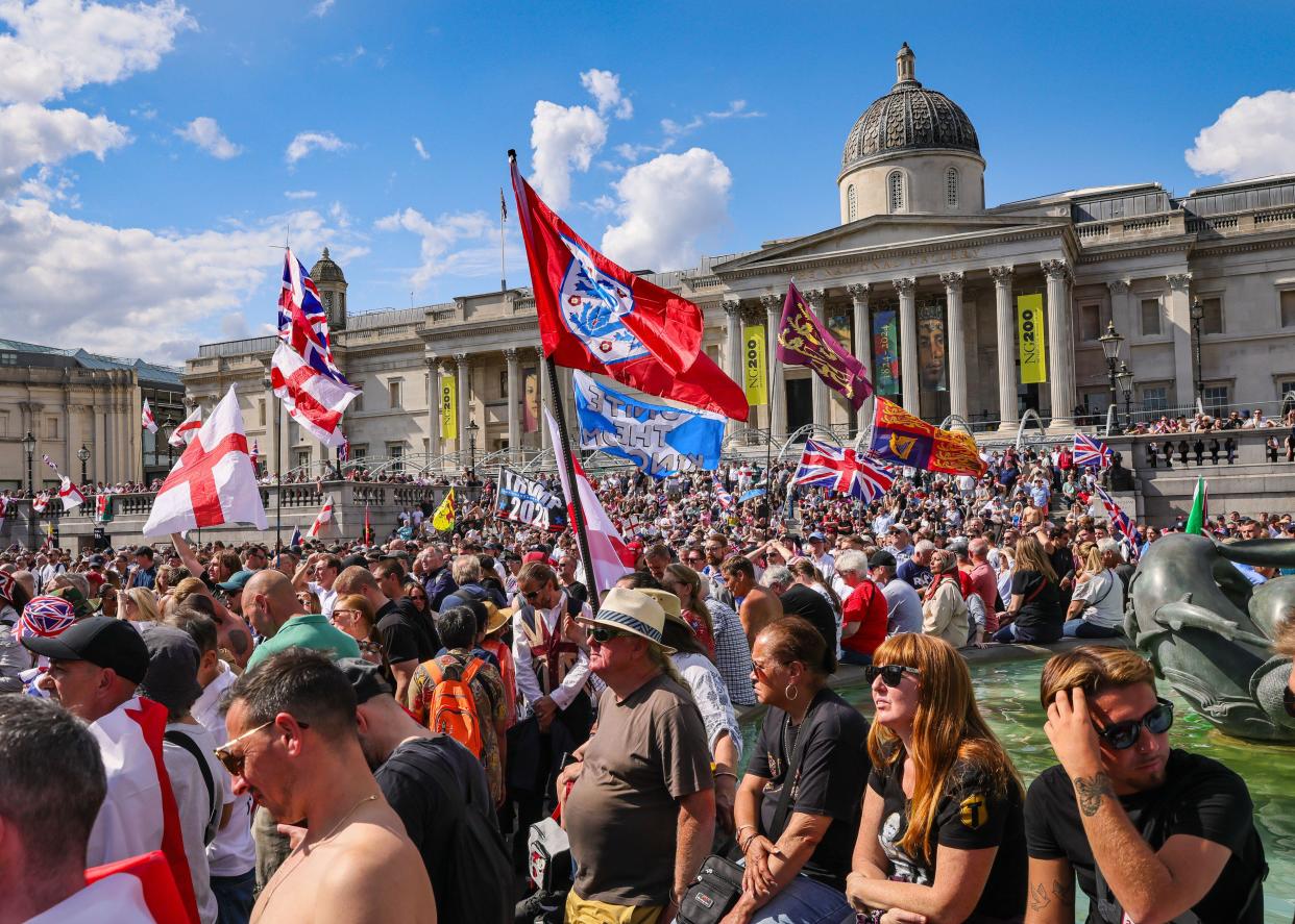 London, UK. 27th July, 2024. Thousands of supporters of Tommy Robinson, real name Stephen Yaxley-Lennon, have marched from the Royal Courts of Justice and are now gathered for a rally in Trafalgar Square, central London. Many have brought Union Jack and St George's Cross flags or are wearing Union Jack colours. Credit: Imageplotter/Alamy Live News