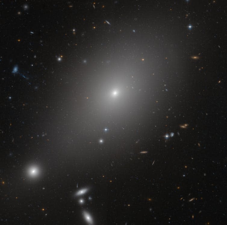 <span class="caption">Elliptical galaxy called ESO 306-17 in the southern sky.</span> <span class="attribution"><span class="source">NASA, ESA and Michael West (ESO)</span></span>