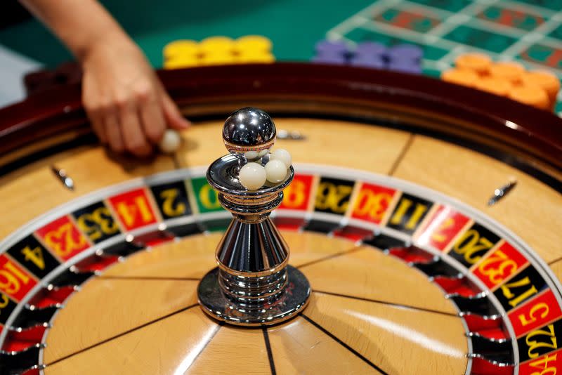 FILE PHOTO: The spinning wheel on a roulette table is seen at Japan Casino School in Tokyo