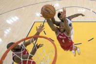 May 20, 2018; Oakland, CA, USA; Houston Rockets forward P.J. Tucker (4) grabs a rebound against Golden State Warriors center Jordan Bell (2) during the second half in game three of the Western conference finals of the 2018 NBA Playoffs at Oracle Arena. The Warriors defeated the Rockets 126-85. Mandatory Credit: Kyle Terada-USA TODAY Sports