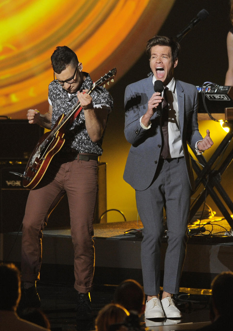 FILE - In this Aug. 14, 2012 file photo, fun. members, from left, Jack Antonoff, and Nate Ruess onstage at the "Teachers Rock" concert at the Nokia Theatre, in Los Angeles. Fun. is part of a breed of newer and lesser known acts who are able to sell out top venues, even if they aren’t selling millions of albums and singles, or dominating with chart-topping tracks and radio airplay. (Photo by Chris Pizzello/Invision/AP, File)