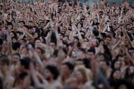 Naked volunteers pose for U.S. artist Spencer Tunick at Bolivar Square in Bogota,Colombia. June 5,2016. REUTERS/John Vizcaino