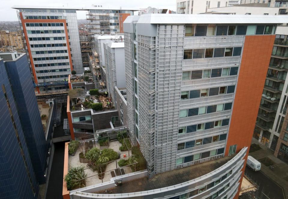 Contractors undertake works at a residential property in Paddington, London, as part of a project to remove and replace non-compliant cladding (PA) (PA Archive)