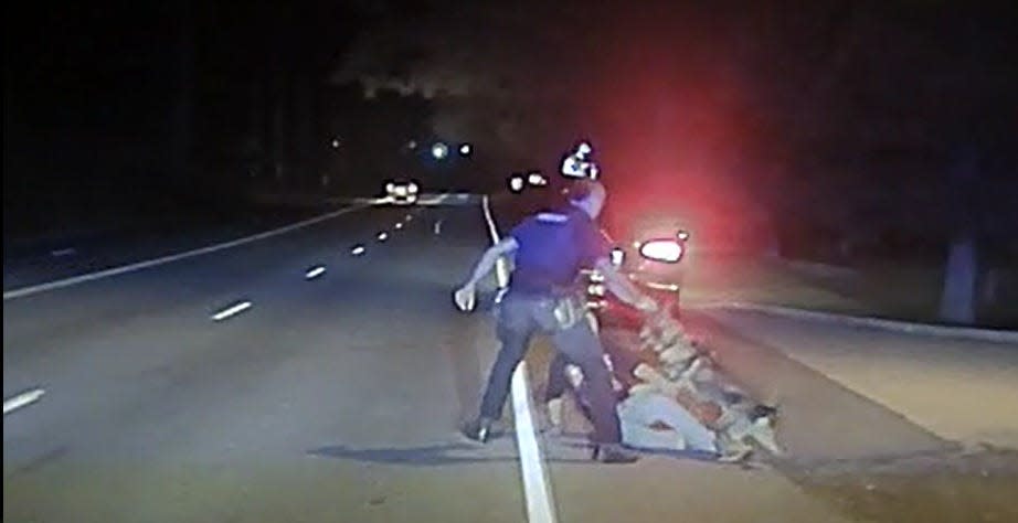 Dash-cam video on Sept. 20, 2019, shows York Police Patrolman Jonathan Rogers and a police K-9 subduing local pediatrician Steven Brennan.