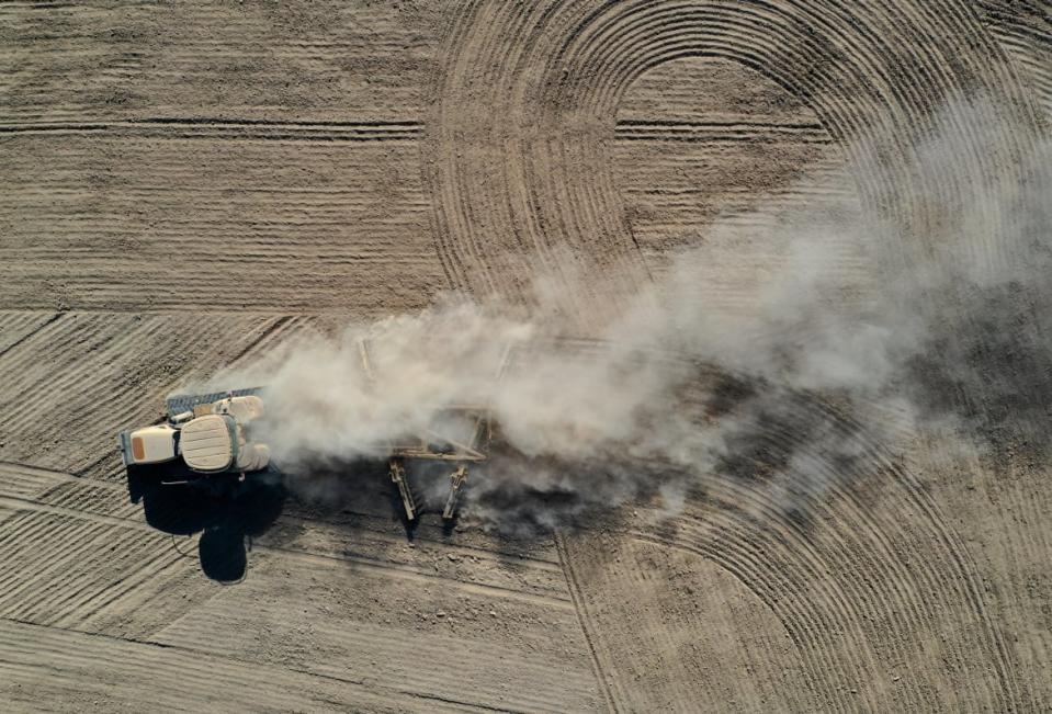 <div class="inline-image__title">1320208440</div> <div class="inline-image__caption"><p>A tractor kicks up dust as it plows a dry field on May 26, 2021 in Chowchilla, California. As California enters an extreme drought emergency, water is starting to become scarce in California's Central Valley, one of the most productive agricultural regions in the world. </p></div> <div class="inline-image__credit">Justin Sullivan/Getty</div>