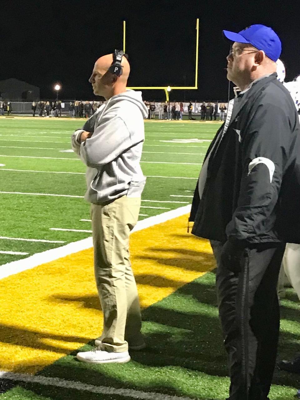 Highland head football coach Ty Stover watches has his team plays at Northmor last season.