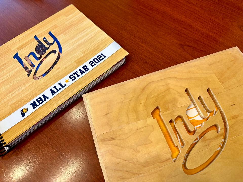 Indy's original bid book (left) for the NBA All-Star game in 2021. The city won the bid, but due to the Covid-19 pandemic, it was moved to 2024.