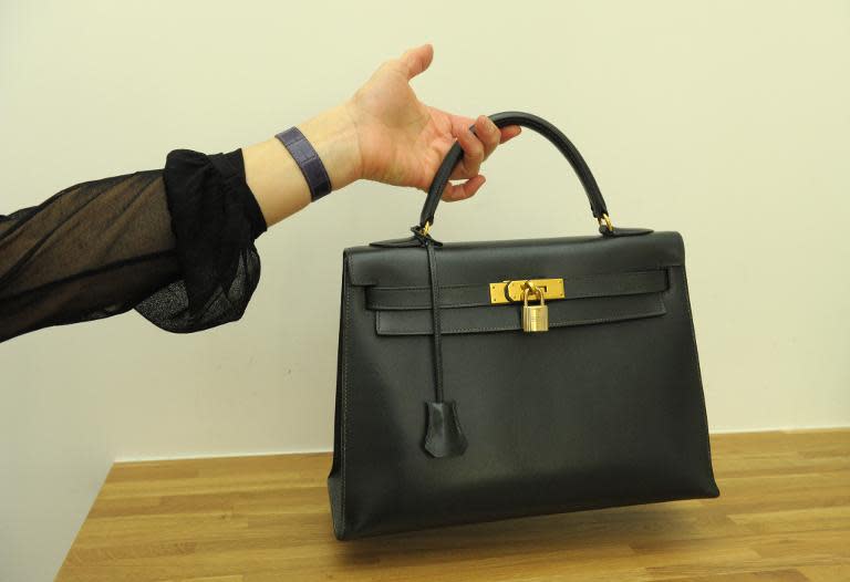 A picture taken in Paris on April 30, 2015 shows a second-hand luxury bag presented at Collector Square showroom, a website and a showroom specialized in second-hand luxury goods