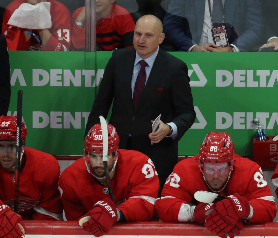Red Wings coach Derek Lalonde on the bench during the Wings' 6-4 win over the Lightning on Saturday, Oct. 14 2023, at Little Caesars Arena.