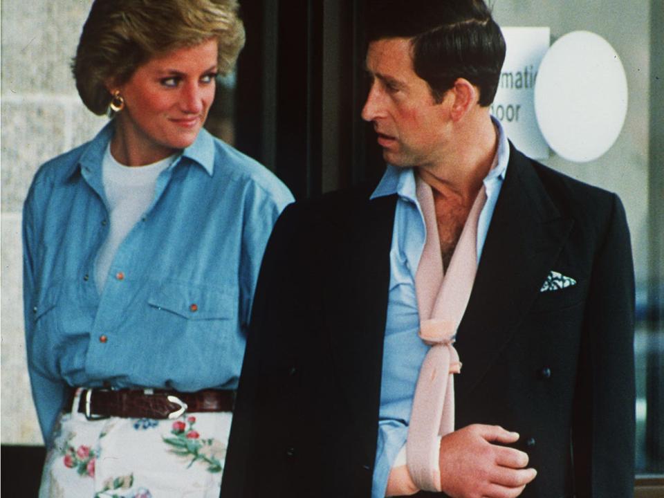 Britain's Prince Charles leaves Cirencester Hospital, England, with Princess Diana, July 1, 1990, with his arm in a sling after falling off his horse and breaking his arm during a polo match. The prince, an avid polo player, broke his right arm in two places and was released in time for the Princess' 29th birthday.