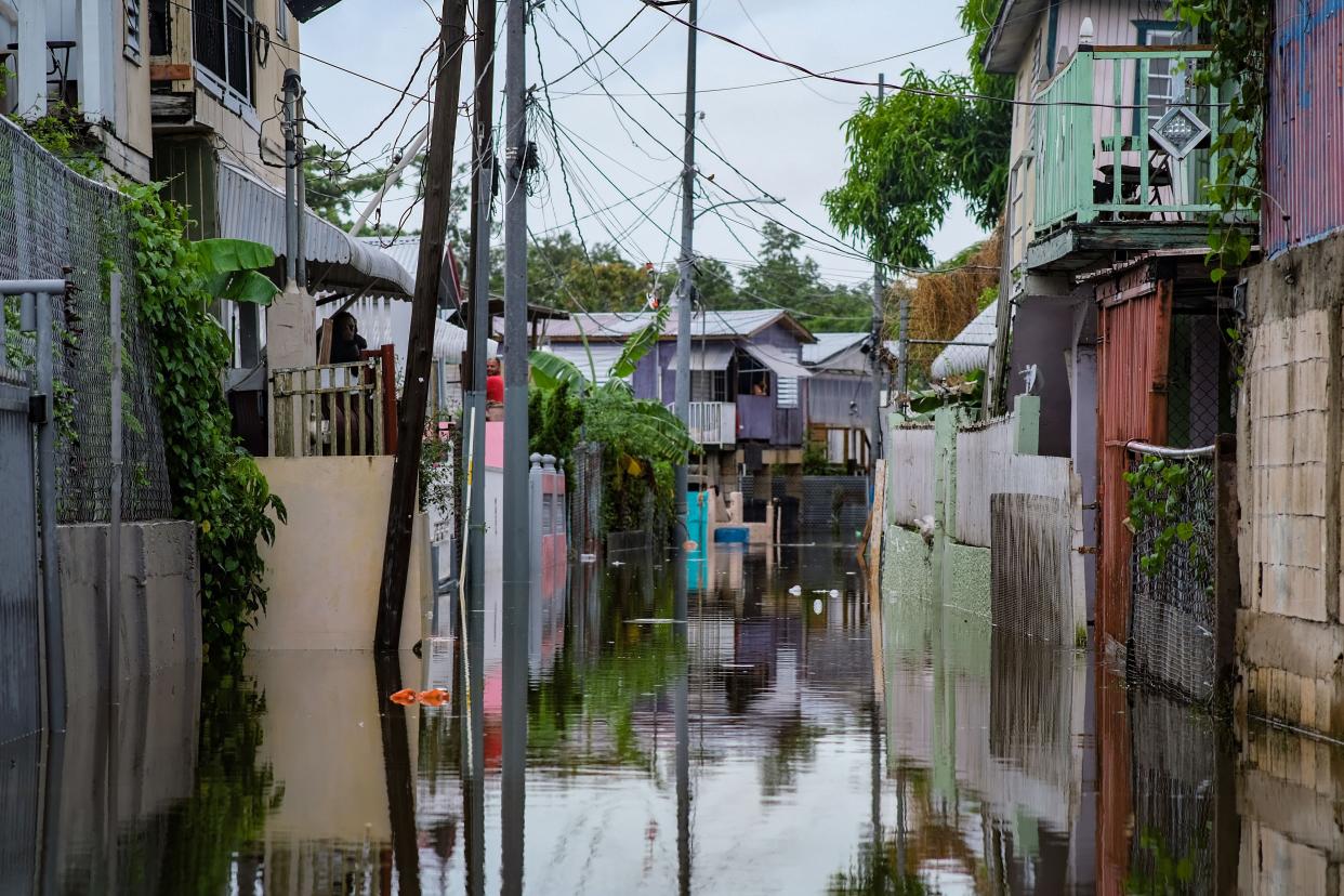 A flooded street is seen in the Juana Matos neighborhood of Catano, Puerto Rico.