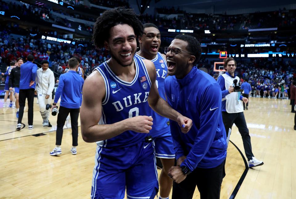 Duke guard Jared McCain (0) celebrates with teammates after their defeat of Houston in the semifinals of the South Regional of the 2024 NCAA men's tournament at American Airlines Center.