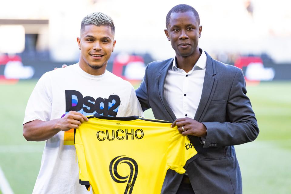 Jul 3, 2022; Columbus, Ohio, USA; Columbus Crew designated player Cucho (9) is introduced by assistant general manager Issa Tall prior to the match against Philadelphia Union at Lower.com Field. Mandatory Credit: Greg Bartram-USA TODAY Sports