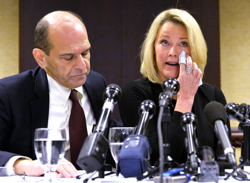 Former Boston news anchor Heather Unruh sits with her attorney Mitchell Garabedian at a press conference in Boston November 8, 2017. (Photo: JOSEPH PREZIOSO via Getty Images)