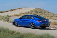 <p>Hyundai says the "Elantra N Line’s sporty side skirts and 18-inch alloy wheels accentuate the fastback sedan’s low and wide aesthetic." Also, those are "arrow-like creases" in the sides.</p>