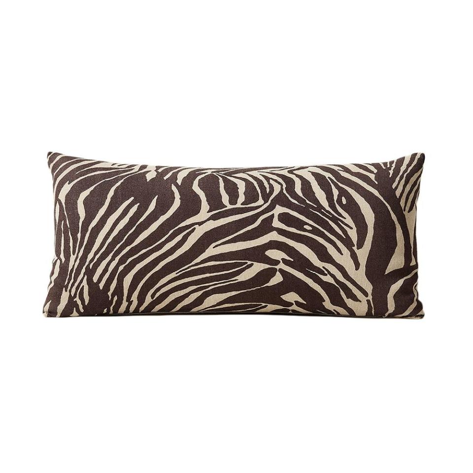 <p><a href="https://www.cb2.com/ziggy-zebra-print-throw-pillow-23x11/f30312" rel="nofollow noopener" target="_blank" data-ylk="slk:Shop Now;elm:context_link;itc:0;sec:content-canvas" class="link ">Shop Now</a></p><p>Ziggy Zebra Print Throw Pillow </p><p>cb2.com</p><p>$34.97</p>