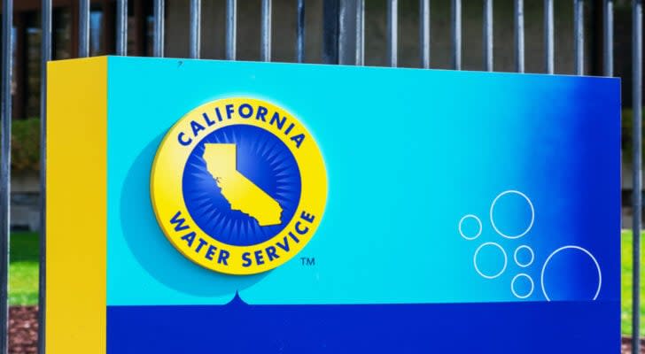 An image of a blue and light blue rectangle sign with the "California Water Service" yellow and blue logo on a lawn.