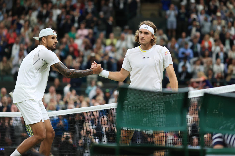 Pictured left to right, Nick Kyrgios shakes hands with Stefanos Tsitsipas after a bad-blooded Wimbledon third round win in 2022. 