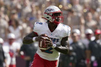 New Mexico quarterback Terry Wilson (2) looks to pass against Texas A&M during the first quarter of an NCAA college football game on Saturday, Sept. 18, 2021, in College Station, Texas. (AP Photo/Sam Craft)