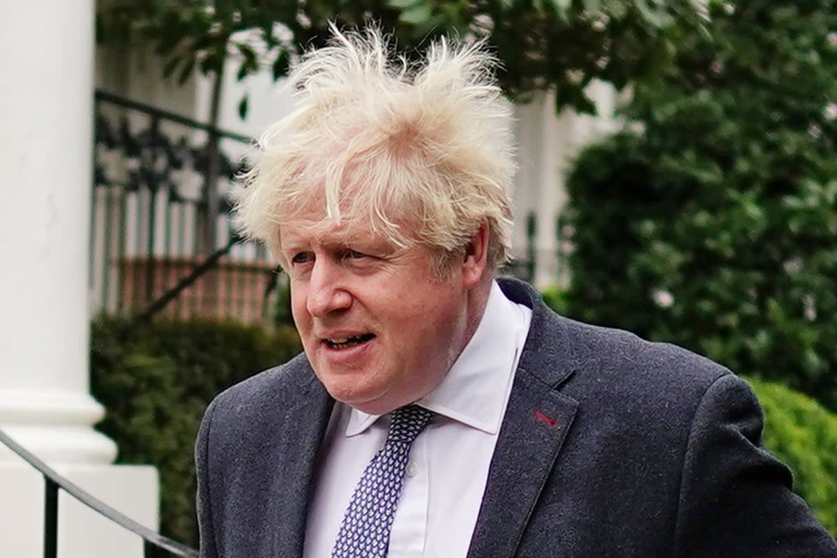 Boris Johnson outside his home on Tuesday (PA)