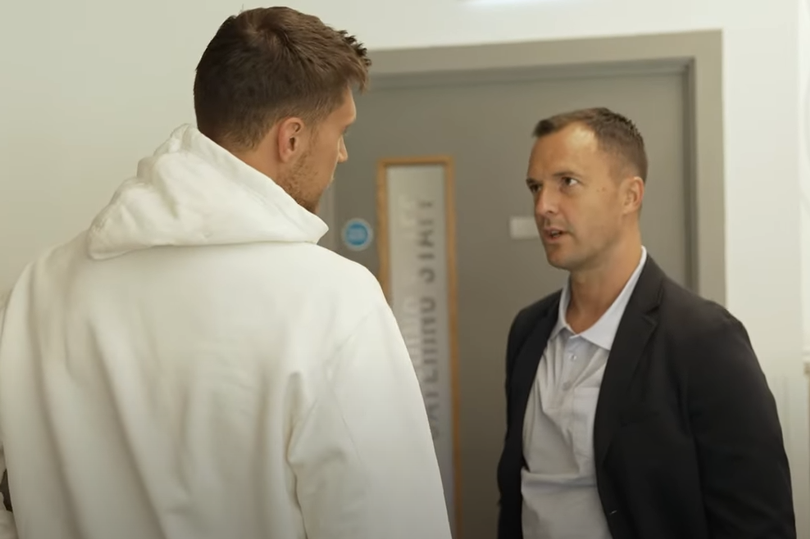 New Birmingham City manager Chris Davies (right) speaks to Krystian Bielik