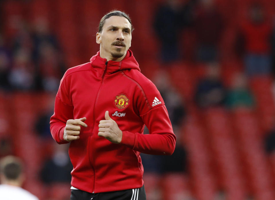 Manchester United's Zlatan Ibrahimovic warms up before the English Premier League soccer match between Manchester United and Everton at Old Trafford in Manchester, England, Tuesday April 4, 2017. (Martin Rickett/PA via AP)