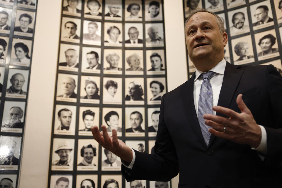 U.S. Second Gentleman, Douglas Emhoff, speaks to the press as he visits to the Oskar Schindler Enamel Factory Museum in Krakow, Poland, Saturday, Jan. 28, 2023. (AP Photo/Michal Dyjuk)