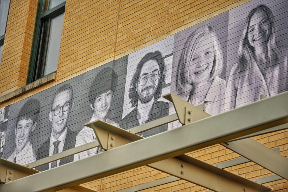 The Alternative School for Math & Science in Corning recently unveiled an art installation featuring alumni portraits to mark the school's 20th anniversary.