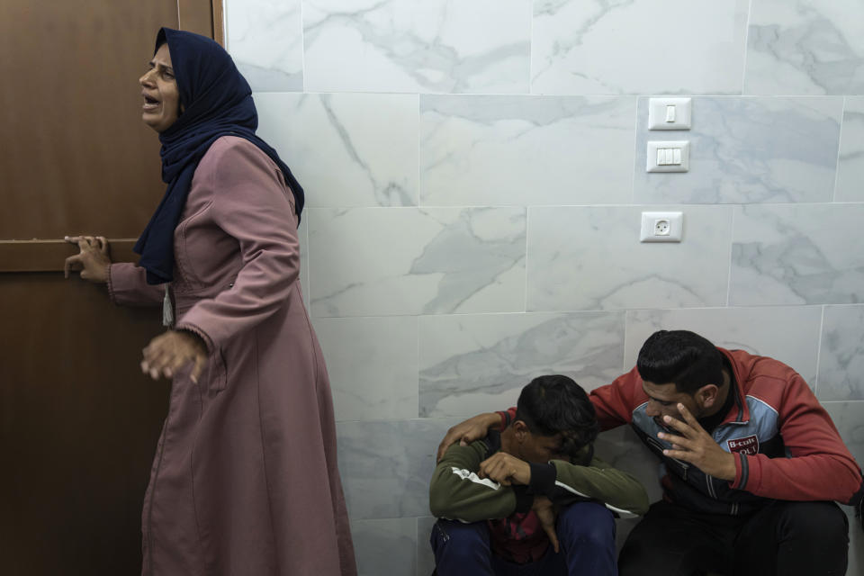 Palestinians mourn for Mohammed Abu Taima, killed in an Israeli airstrike, in Khan Younis in the Gaza Strip, Wednesday, May 10, 2023. Israeli authorities say Palestinian militants in the Gaza Strip have launched rockets toward southern Israel. Wednesday's launch comes a day after Israeli airstrikes killed three militant leaders and at least 10 civilians. (AP Photo/Fatima Shbair)