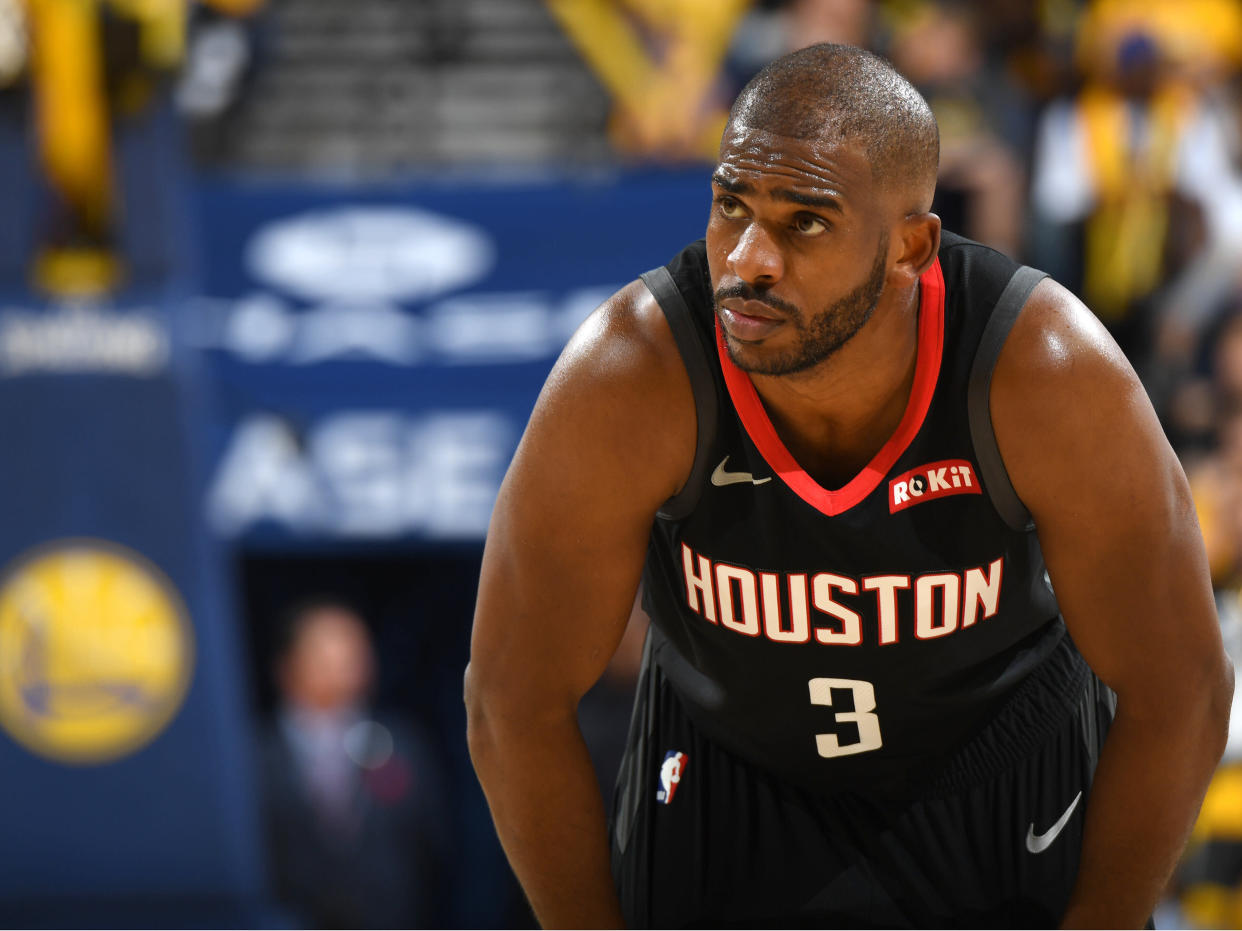 OAKLAND, CA - APRIL 28: Chris Paul #3 of the Houston Rockets looks on against the Golden State Warriors during the Western Conference Semi-Finals of the NBA Playoffs on April 28, 2019 at ORACLE Arena in Oakland, California. NOTE TO USER: User expressly acknowledges and agrees that, by downloading and or using this photograph, user is consenting to the terms and conditions of Getty Images License Agreement. Mandatory Copyright Notice: Copyright 2019 NBAE (Photo by Andrew D. Bernstein/NBAE via Getty Images)