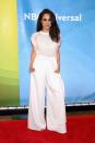 <p>Markle makes a fashion statement in white flare pants while she attends NBC's 2015 New York Summer Press Day at the Four Seasons Hotel. </p>