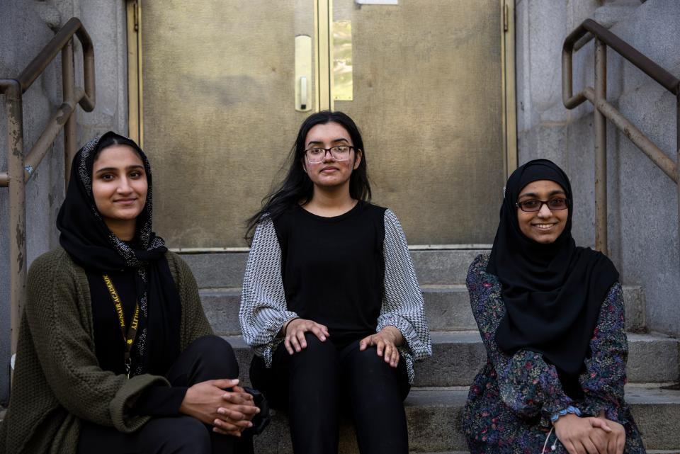 McNair Academic High School students (from left) Noran Nazir, Fatimah Khalid, and Pariza Hassan outside the school on Tuesday, May 10, 2022. 
