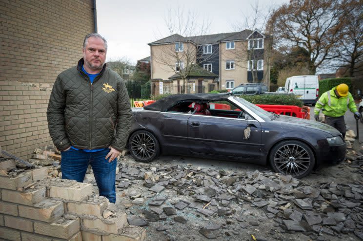 Audi do that? Blundering binman crashes into garage crushing £12,000 car inside