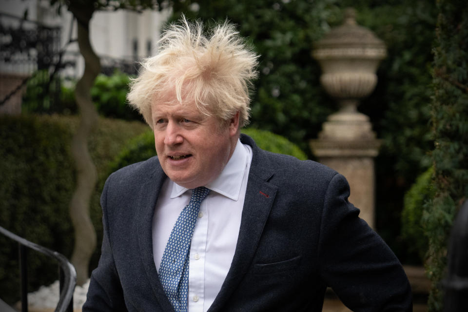 LONDON, ENGLAND - MARCH 21: Former British prime minister Boris Johnson leaves his home on March 21, 2023 in London, England. The former prime minister will attend a televised evidence session on Wednesday in front of the Commons Privileges Committee, which has previously suggested that Mr Johnson may have misled Parliament in his statements about parties at Number 10 during the Covid-19 lockdown. (Photo by Carl Court/Getty Images)