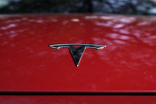 Tesla says will costs next generation cars in half
