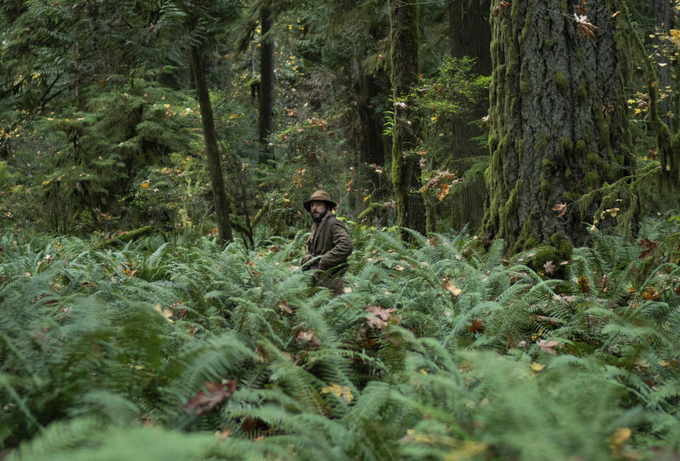 This image released by A24 Films shows John Magaro in a scene from "First Cow." (Allyson Riggs/A24 Films via AP)