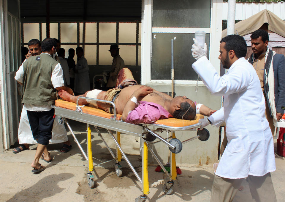 <p>A man is transported to a hospital after he was wounded in a reported air strike on the Iran-backed Huthi rebels’ stronghold province of Saada, Aug. 9, 2018. (Photo: Stringer/AFP/Getty Images) </p>