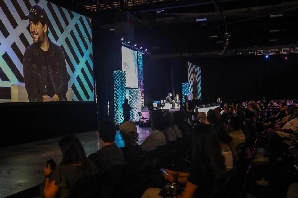 American entrepreneur Alexis Kerry Ohanian smiles as his image is displayed on screen during a live interview during Emerge Americas 2022.