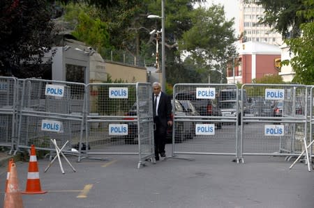 FILE PHOTO: An official walks past the barriers at the gate of Saudi Arabia's consulate in Istanbul