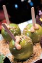 <p>These creepy crawly candy apples will be sure to give your family a fright, but they'll forgive you when they realize how tasty they are. </p><p>Get the <strong><a href="https://www.womansday.com/food-recipes/food-drinks/a28858378/candy-apples-with-gummy-worms-recipe/" rel="nofollow noopener" target="_blank" data-ylk="slk:Candy Apples with Gummy Worms recipe" class="link ">Candy Apples with Gummy Worms recipe</a></strong>.</p>