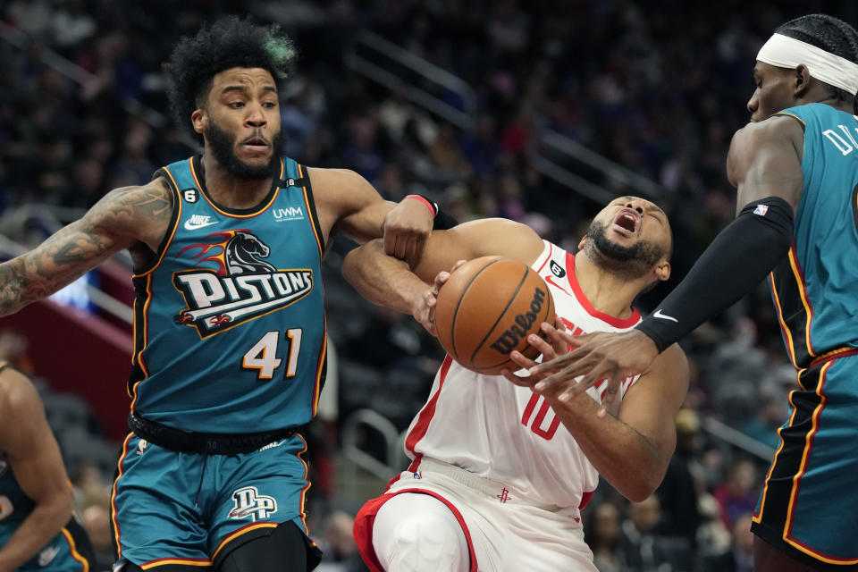 Houston Rockets guard Eric Gordon (10) is fouled by Detroit Pistons forward Saddiq Bey (41) during the second half of an NBA basketball game, Saturday, Jan. 28, 2023, in Detroit. (AP Photo/Carlos Osorio)