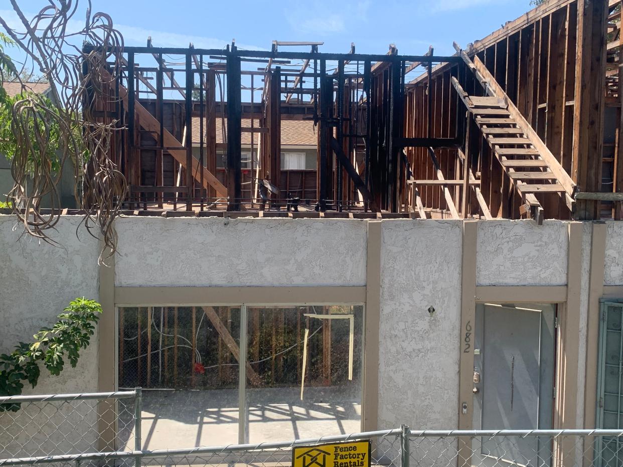 Some 16 months after a fire razed a condominium building at the Wildwood One Township complex in Thousand Oaks, repairs have yet to begin.